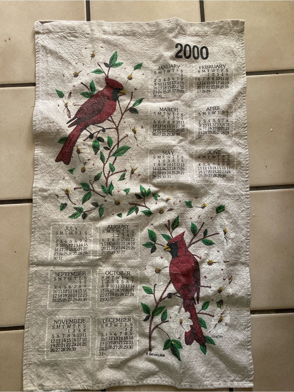 Cloth 2000 calendar with cardnail on it